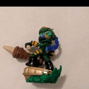 Action Adventure Figurine with Green and Blue Details